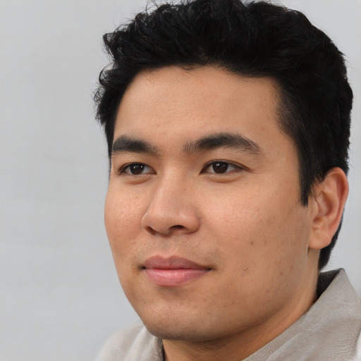 Neutral asian young-adult male with short  black hair and brown eyes