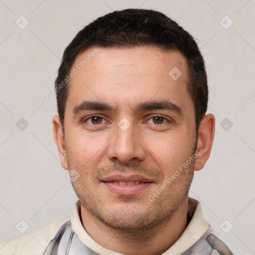 Joyful white young-adult male with short  brown hair and brown eyes