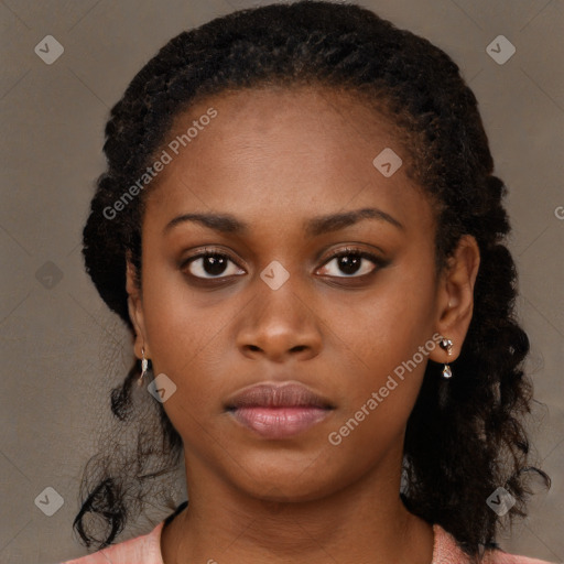 Neutral black young-adult female with medium  brown hair and brown eyes