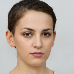 Neutral white young-adult female with short  brown hair and brown eyes