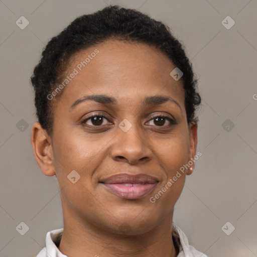 Joyful black young-adult female with short  brown hair and brown eyes