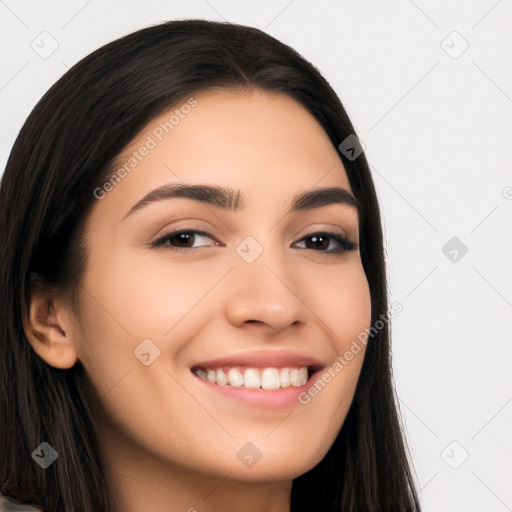 Joyful latino young-adult female with long  black hair and brown eyes