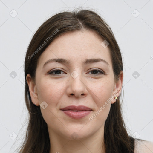 Joyful white young-adult female with long  brown hair and grey eyes