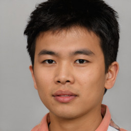 Neutral asian young-adult male with short  brown hair and brown eyes