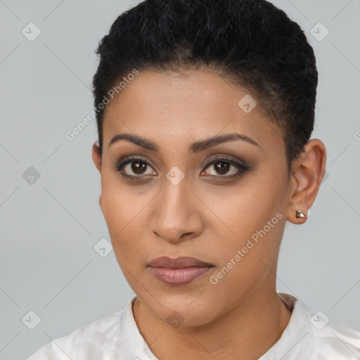 Joyful latino young-adult female with short  brown hair and brown eyes