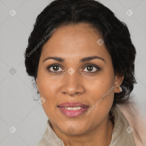 Joyful black adult female with medium  brown hair and brown eyes