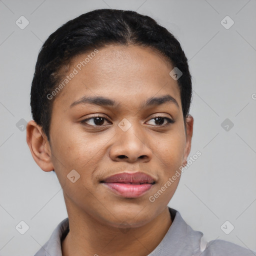 Joyful black young-adult female with short  black hair and brown eyes