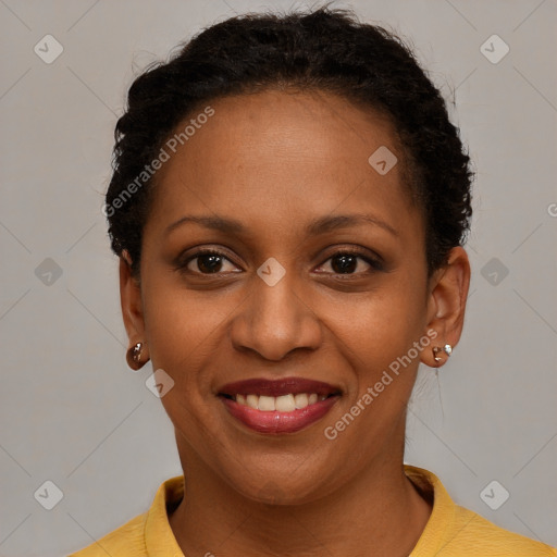 Joyful black young-adult female with short  brown hair and brown eyes