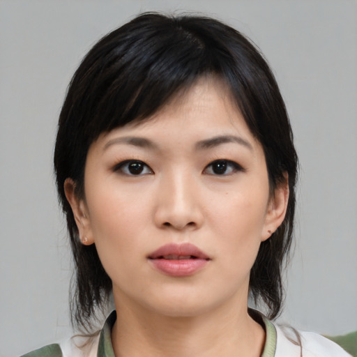 Neutral asian young-adult female with medium  black hair and brown eyes