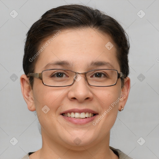 Joyful white adult female with short  brown hair and brown eyes