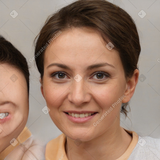 Joyful white young-adult female with medium  brown hair and brown eyes