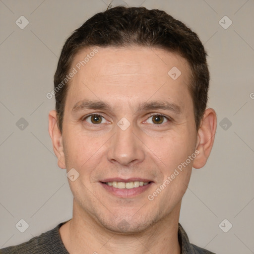 Joyful white adult male with short  brown hair and grey eyes