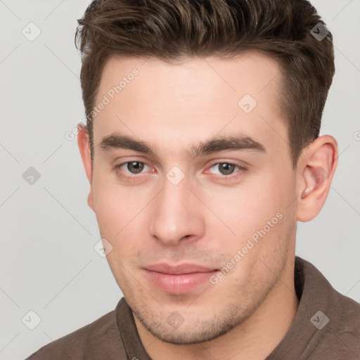 Neutral white young-adult male with short  brown hair and brown eyes