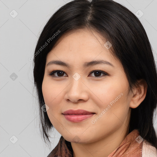 Joyful asian young-adult female with medium  brown hair and brown eyes