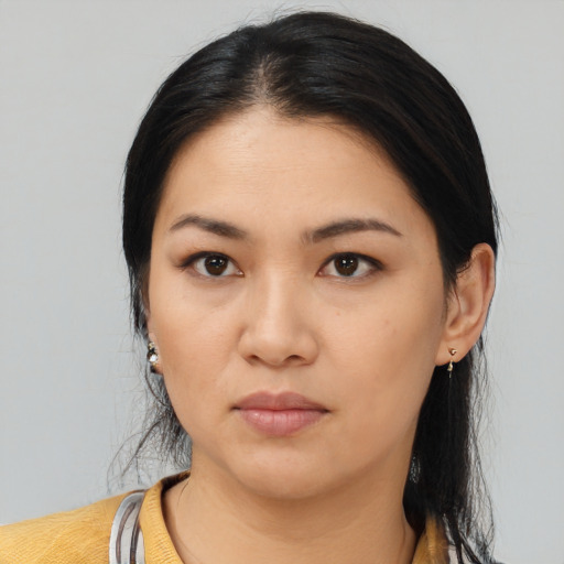 Neutral asian young-adult female with medium  black hair and brown eyes