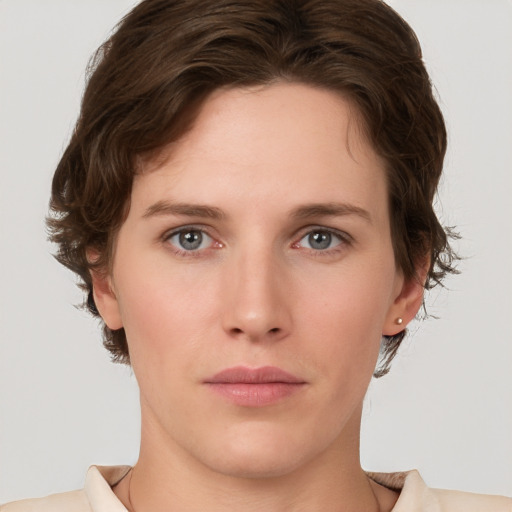 Neutral white young-adult female with short  brown hair and brown eyes