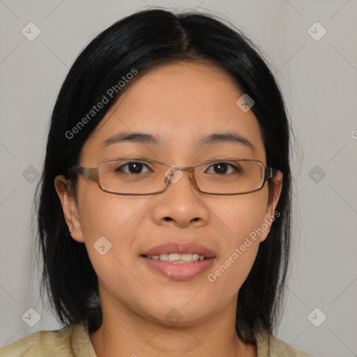 Joyful asian young-adult female with medium  brown hair and brown eyes