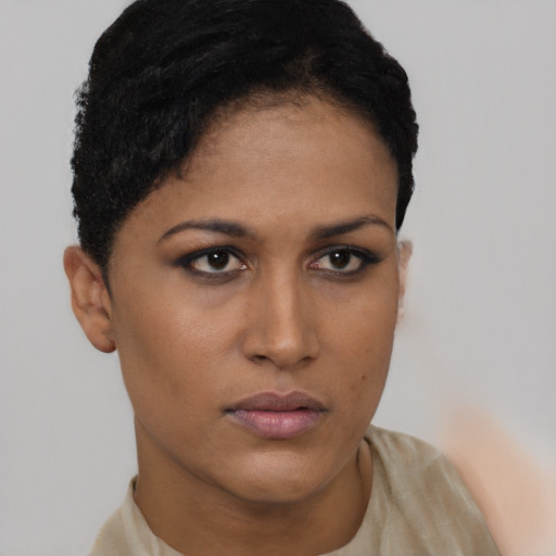 Neutral latino young-adult female with short  brown hair and brown eyes