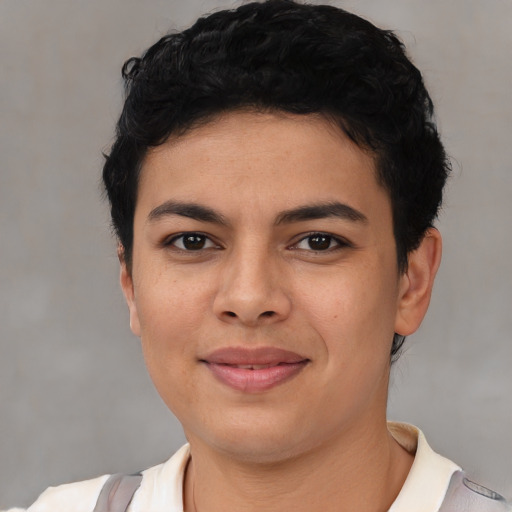 Joyful asian young-adult female with short  black hair and brown eyes