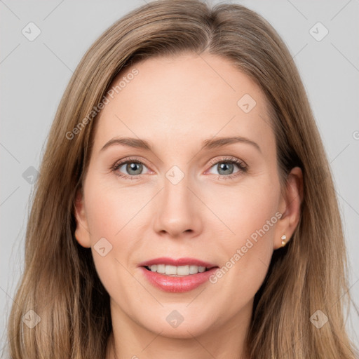 Joyful white young-adult female with long  brown hair and grey eyes