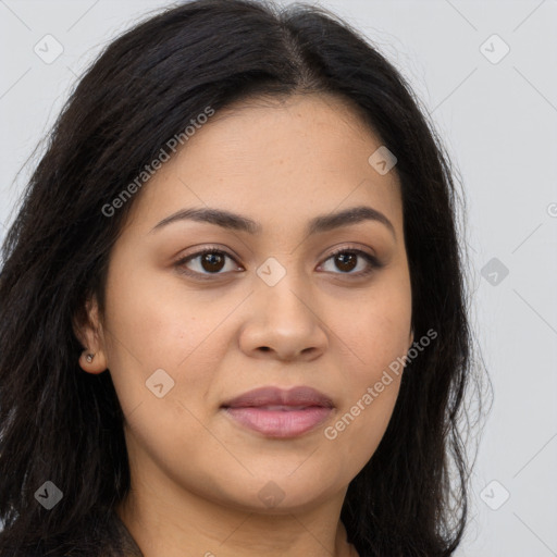 Joyful latino young-adult female with long  brown hair and brown eyes