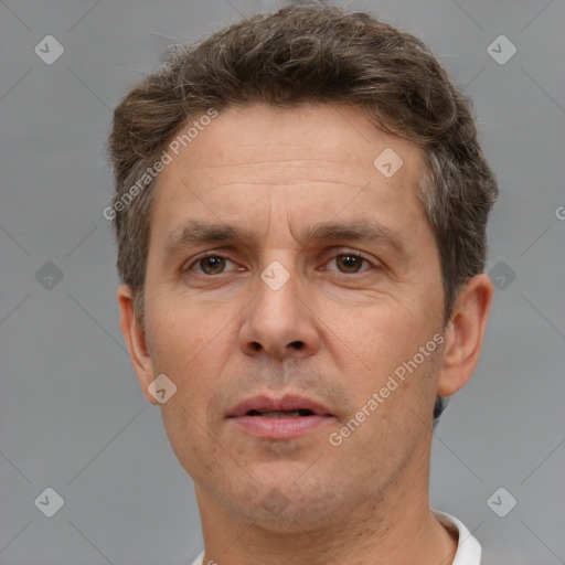 Neutral white adult male with short  brown hair and brown eyes