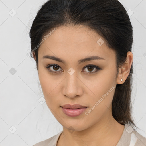 Joyful asian young-adult female with medium  brown hair and brown eyes