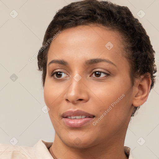 Joyful white young-adult female with short  brown hair and brown eyes