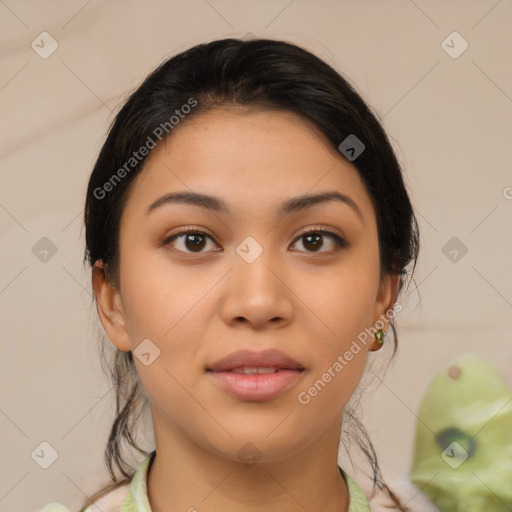 Joyful latino young-adult female with medium  brown hair and brown eyes