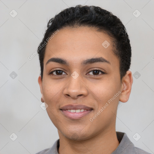 Joyful latino young-adult female with short  black hair and brown eyes