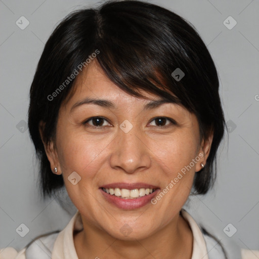 Joyful white adult female with medium  brown hair and brown eyes