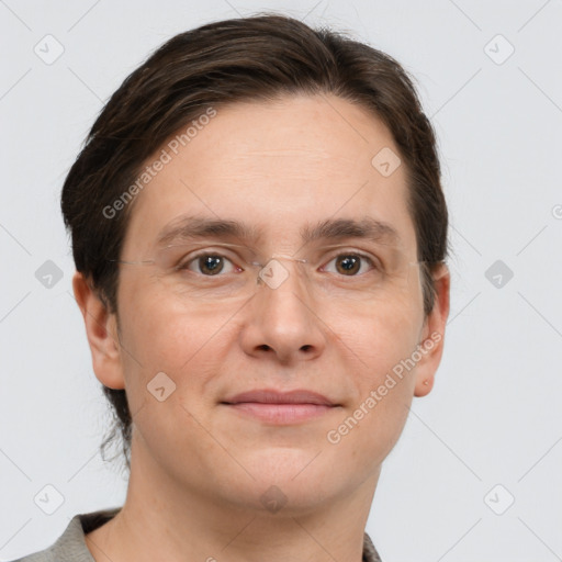 Joyful white adult male with short  brown hair and grey eyes