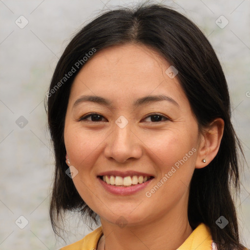 Joyful white young-adult female with medium  brown hair and brown eyes