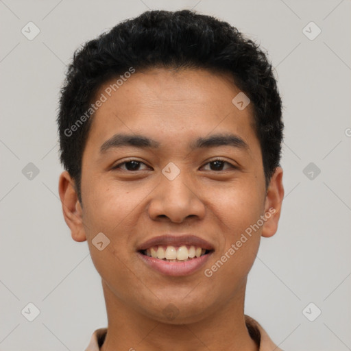 Joyful latino young-adult male with short  black hair and brown eyes