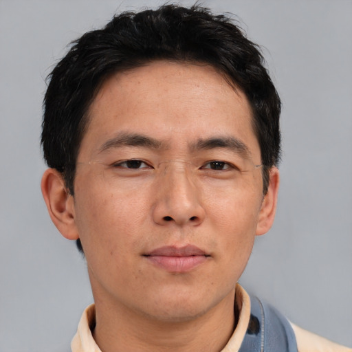 Neutral asian adult male with short  brown hair and brown eyes