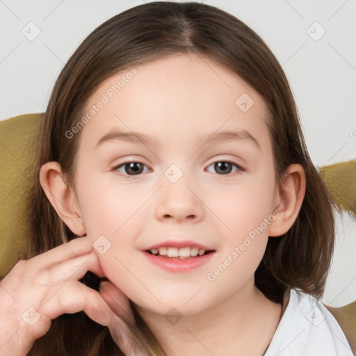 Joyful white child female with medium  brown hair and brown eyes