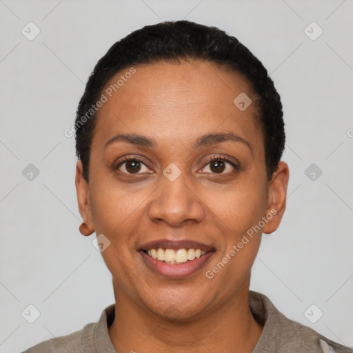 Joyful latino young-adult female with short  black hair and brown eyes