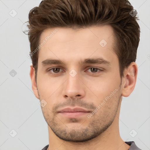 Neutral white young-adult male with short  brown hair and brown eyes