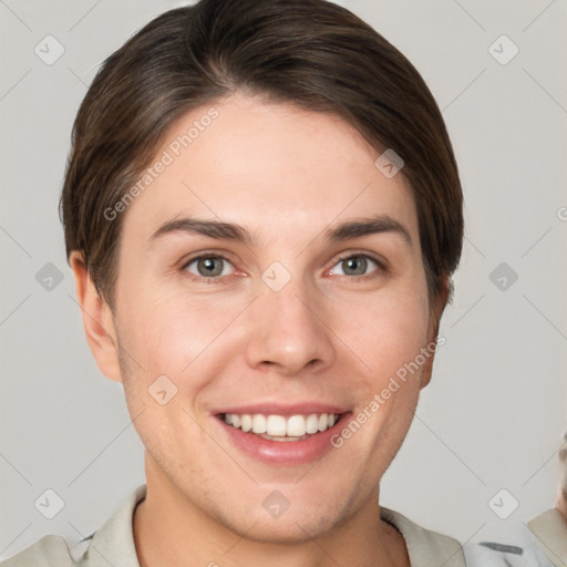 Joyful white young-adult female with short  brown hair and grey eyes