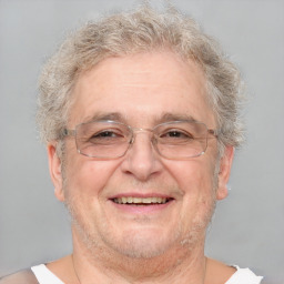 Joyful white middle-aged male with short  brown hair and brown eyes