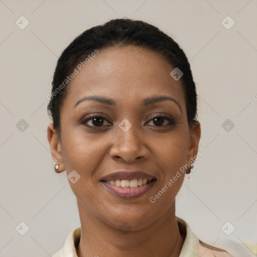 Joyful latino young-adult female with short  black hair and brown eyes