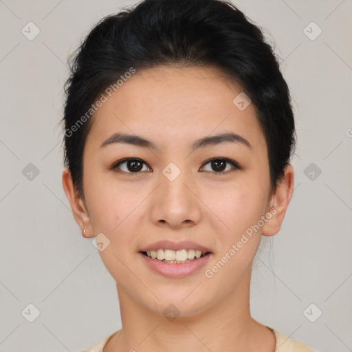 Joyful asian young-adult female with short  brown hair and brown eyes