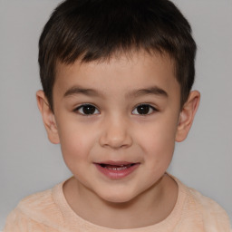 Joyful white child male with short  brown hair and brown eyes