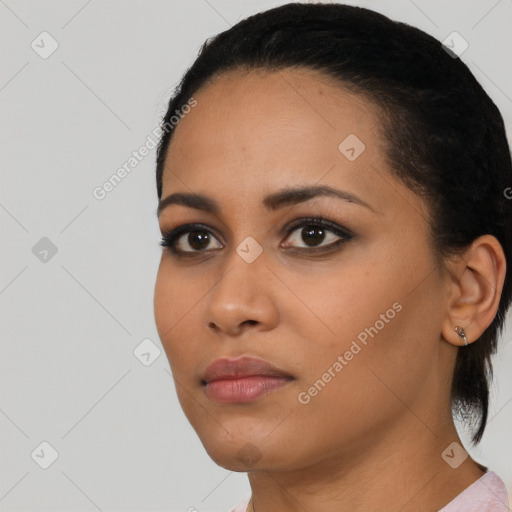 Neutral black young-adult female with medium  black hair and brown eyes