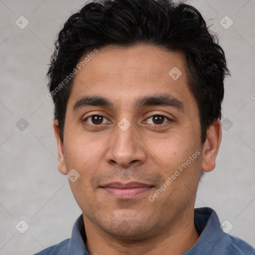 Joyful white young-adult male with short  black hair and brown eyes