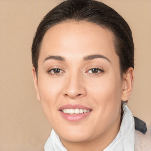 Joyful white young-adult female with medium  brown hair and brown eyes