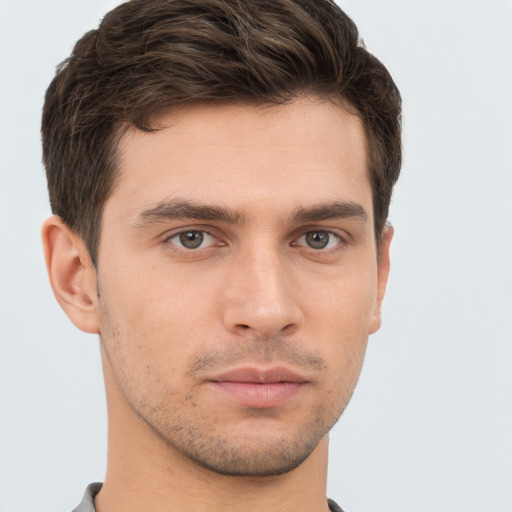 Neutral white young-adult male with short  brown hair and brown eyes