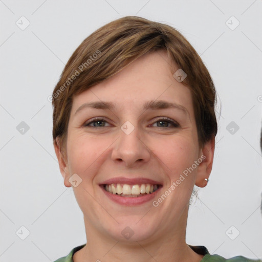 Joyful white young-adult female with short  brown hair and grey eyes