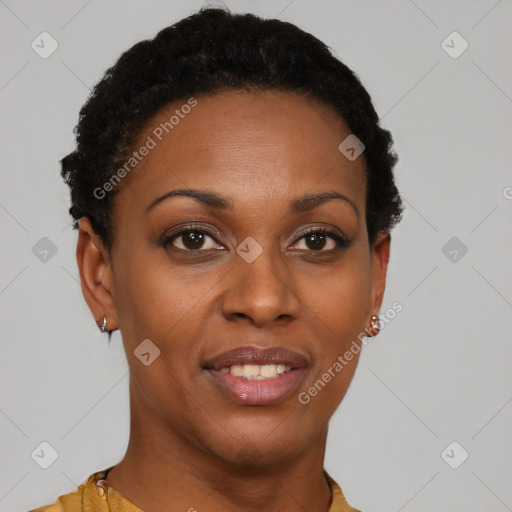 Joyful black young-adult female with short  brown hair and brown eyes