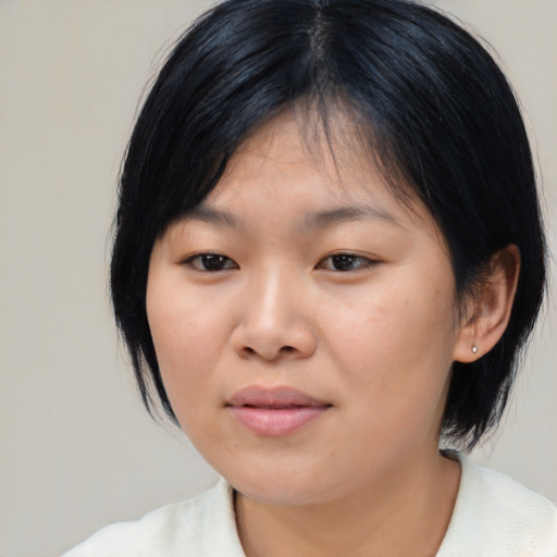 Neutral asian young-adult female with medium  black hair and brown eyes